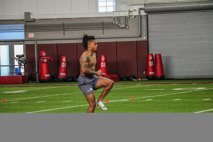 Ahmarean Brown getting warmed up for the 40-yard dash